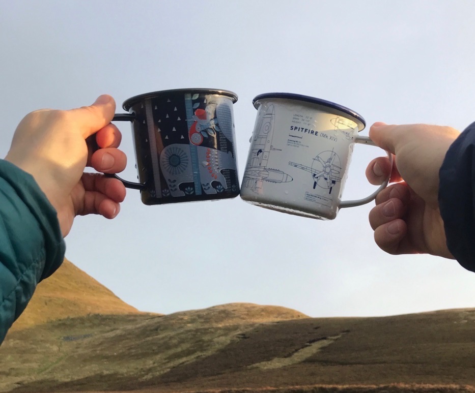 Tin cup toast in the Berwyn Mountains