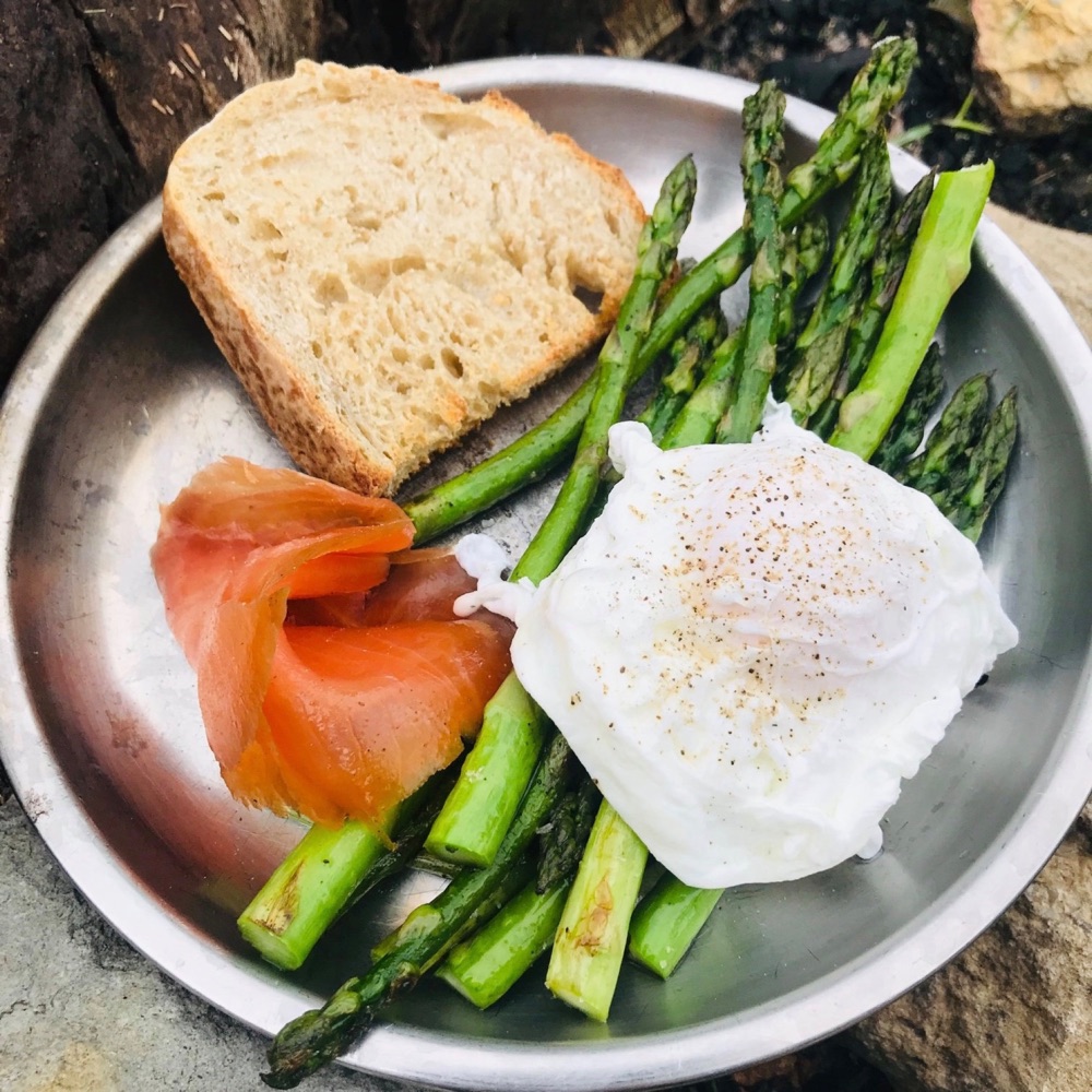 Ultimate wild camping breakfast: sourdough bread, pan fried asparagus, poached eggs, smoked salmon