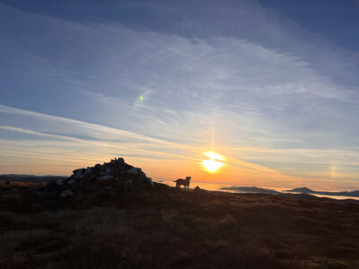 Cairn en route to Ben Alder, sun bow on the right.